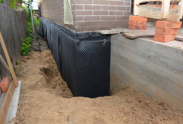 Happy homeowners after waterproofing job in Valley